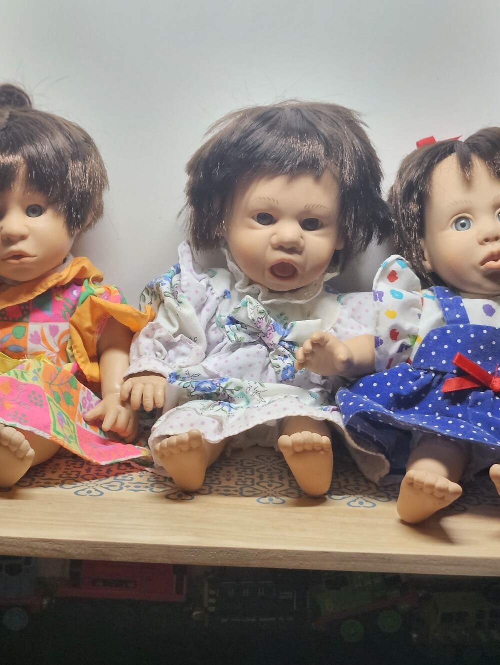 Brown-Haired Baby Doll in Floral White Dress - Kids Toys Gigo Dolls